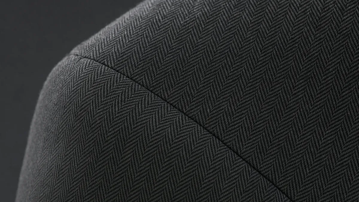 Macro detail of an item: clean factory workmanship – even stitching, tidy edges